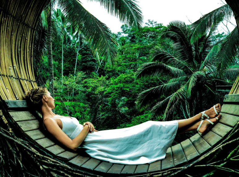 woman resting on hammock